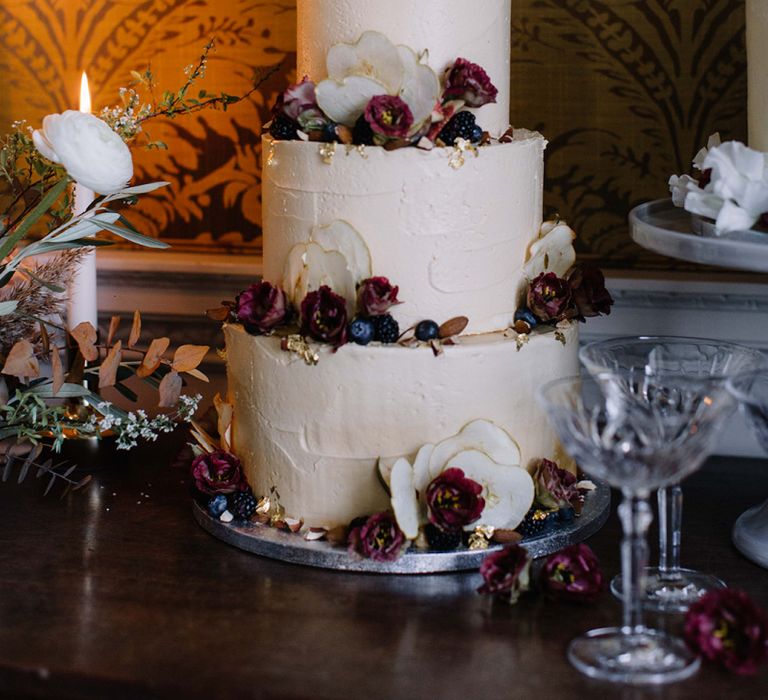 Three Tier Frosting Wedding Cake with Red Flower Decor  and Cake Topper