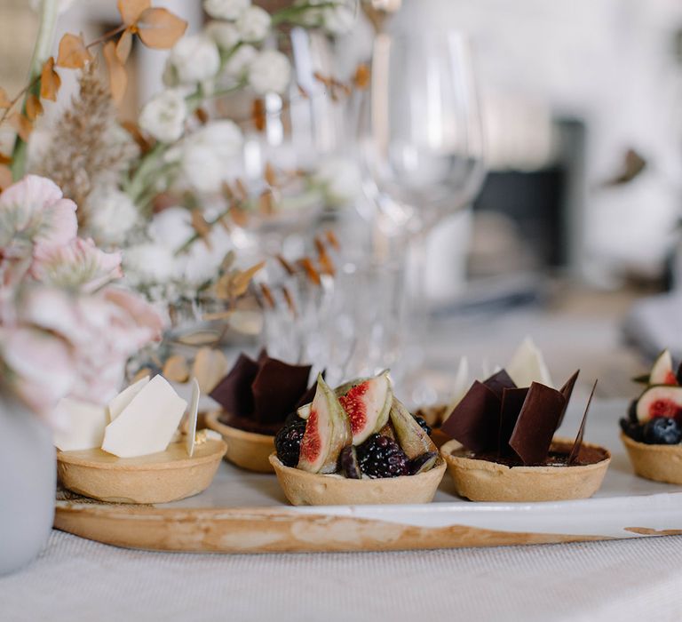 Individual Tarts with Figs, Berries and Chocolate Toppers