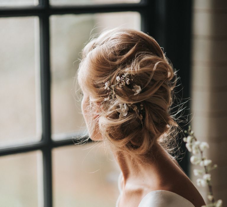 Loosely pinned wedding updo