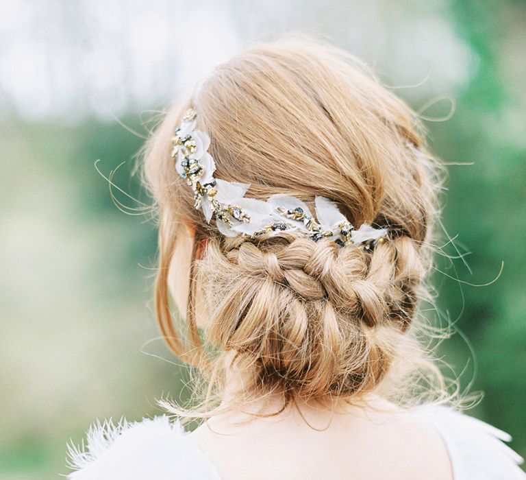 Feminine braid showcasing a delicate crystal encrusted hair accessory from Feather and Coal