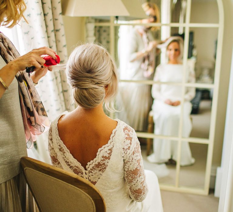 Blonde bride with chignon updo