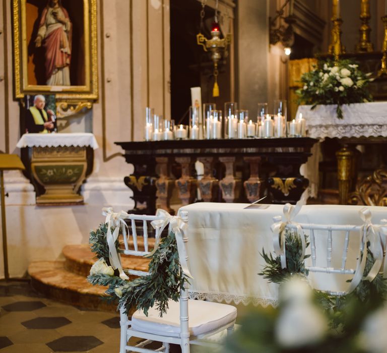 Greenery Garland Chair Back Decor | Green &amp; White Bohemian Wedding in the Rain at Castello di San Sebastiano da Po, Italy | Margherita Calati Photography | Second Shooter Carlo Vittorio