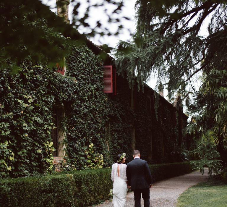 Bride in Laure De Sagazan Gown | Groom in Black Suit | Green &amp; White Bohemian Wedding in the Rain at Castello di San Sebastiano da Po, Italy | Margherita Calati Photography | Second Shooter Carlo Vittorio