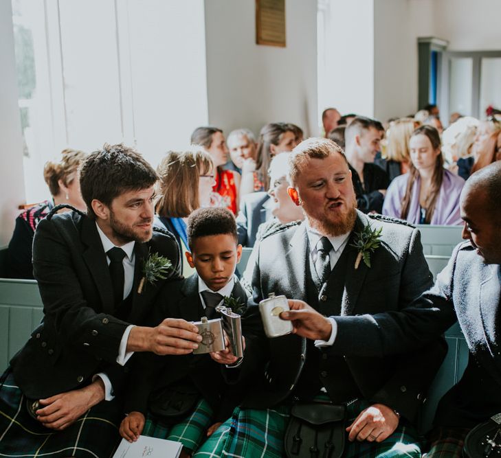 Groom and Groomsmen toast the ceremony