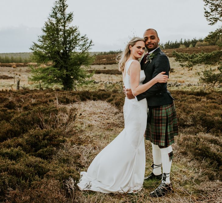 Scottish wedding with marquee decorated in hanging flowers