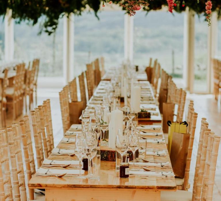 Amazing hanging flower decor in marquee reception