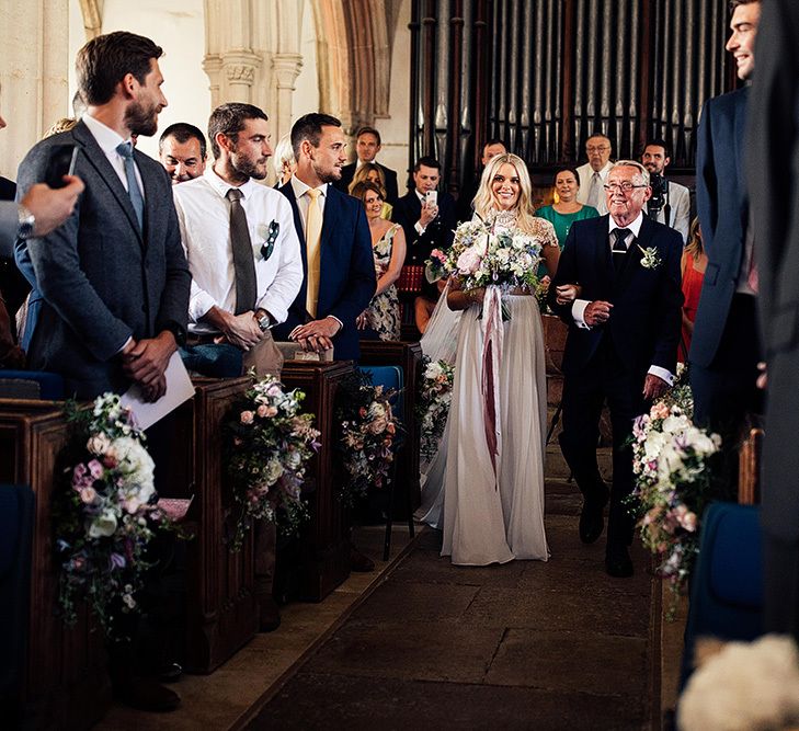 Church wedding ceremony bridal entrance in Julio Vino wedding dress