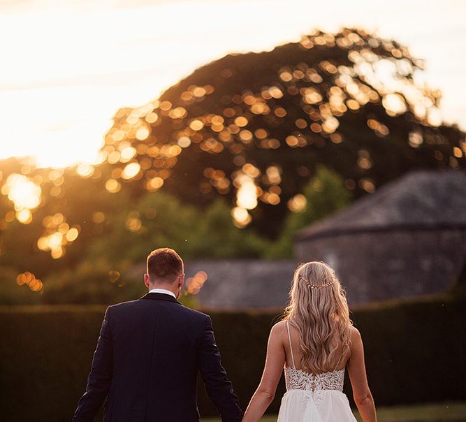 Golden hour portrait with bride in Julio Vino wedding dress