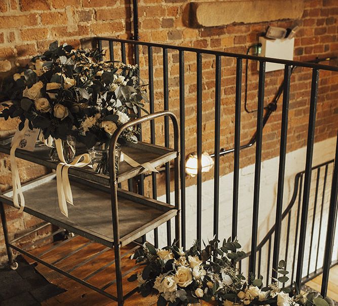 White and Green Wedding Bouquets Tied with Ribbon