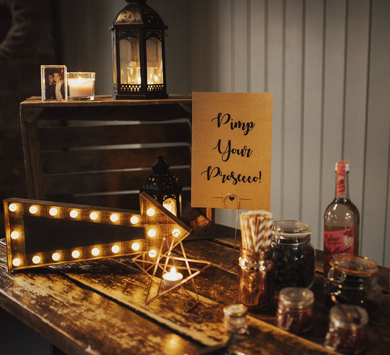 Pimp Your Prosecco Station with Marquee Arrow Light and Berries