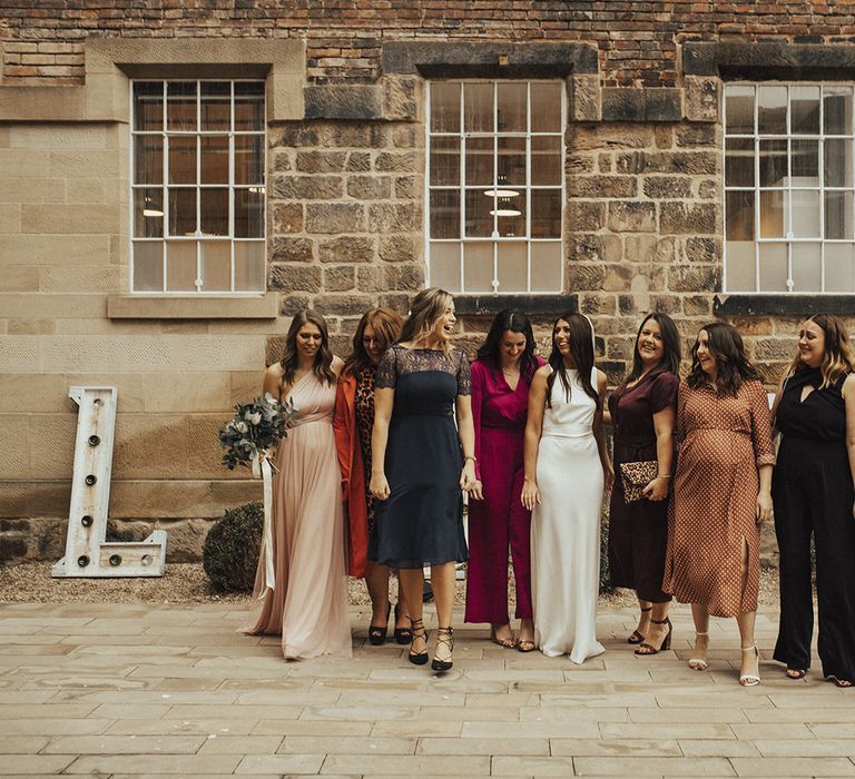 Bride in Charlie Brear Wedding Dress and Her Best Girls in Jewel Toned Wedding Guest Outfits