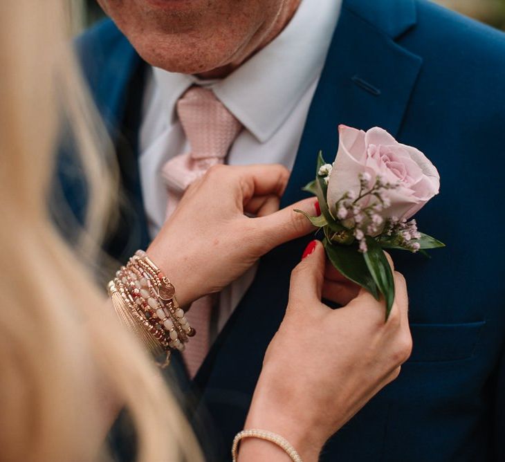 Blush flower buttonhole at Irish wedding