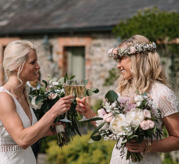 Bride and bride toast their big day