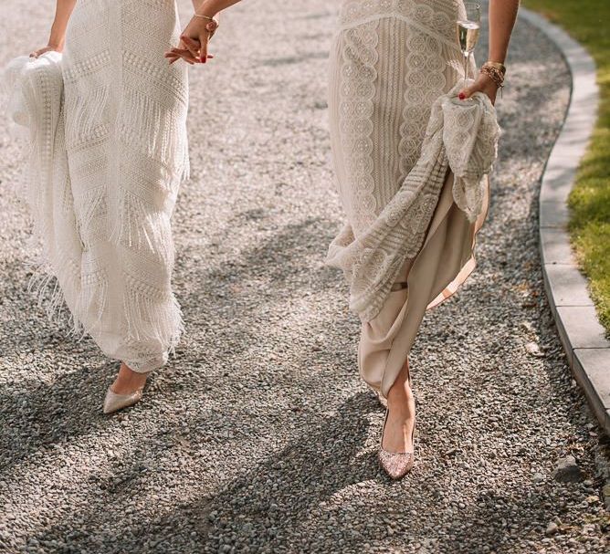 Bride and bride in Watters wedding dress