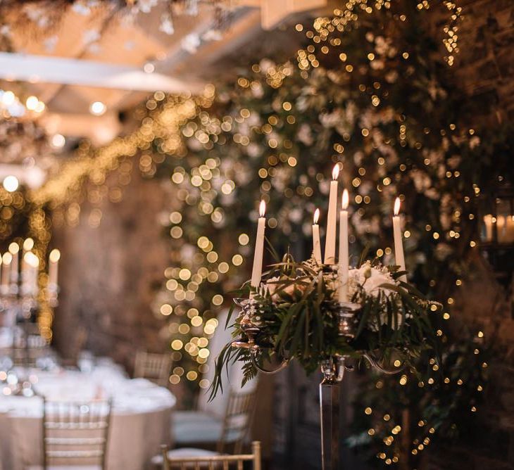 Beautiful wedding lighting with candles at Ballymagarvey Village in Ireland