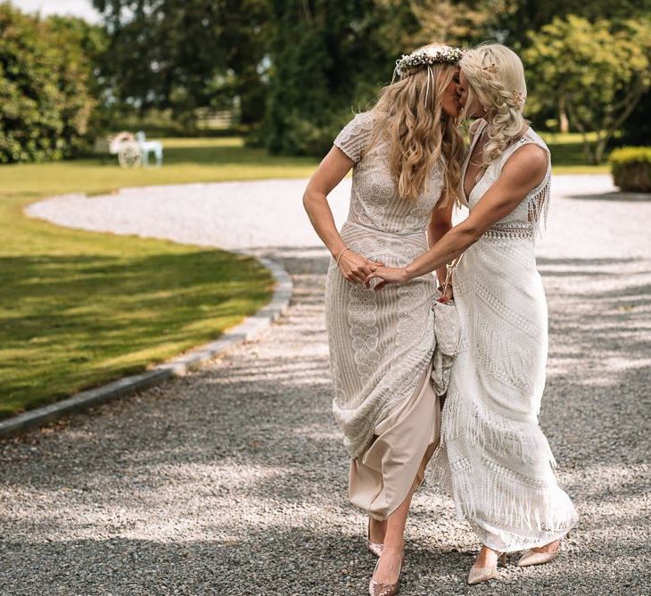 Bride and bride in Watters wedding dress