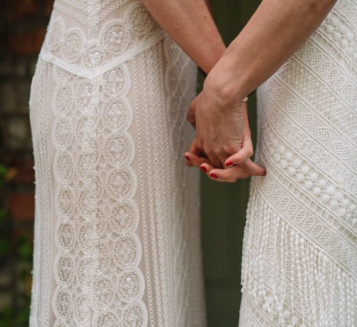 Bride and bride in Watters wedding dress