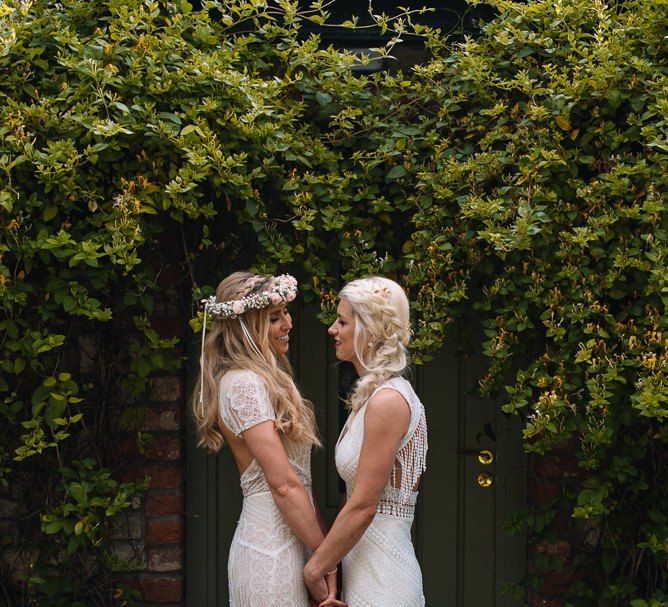 Bride and bride in Watters wedding dress