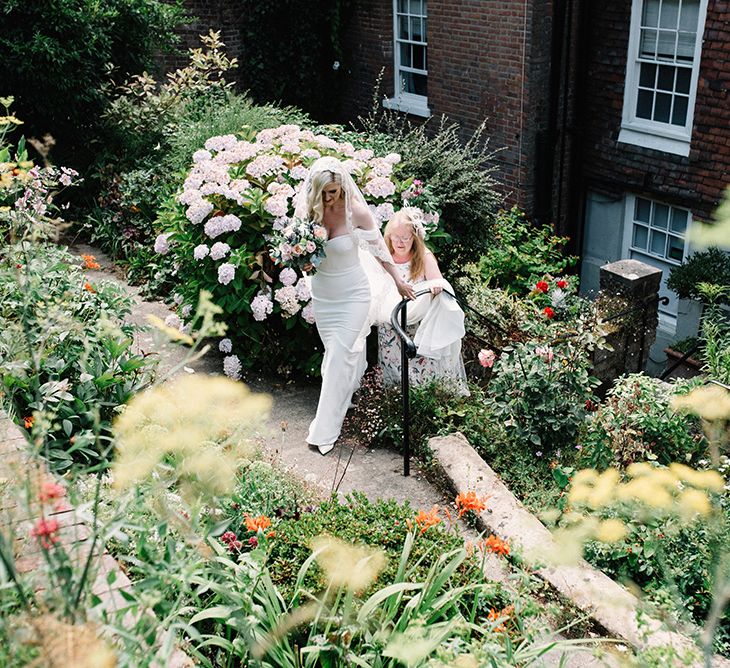 Mother of The Bride and Bride Walking to the Wedding Ceremony