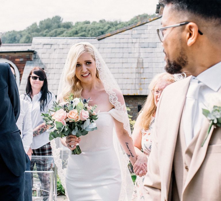 Bride Getting Emotional Walking Down the Aisle Towards Her Groom