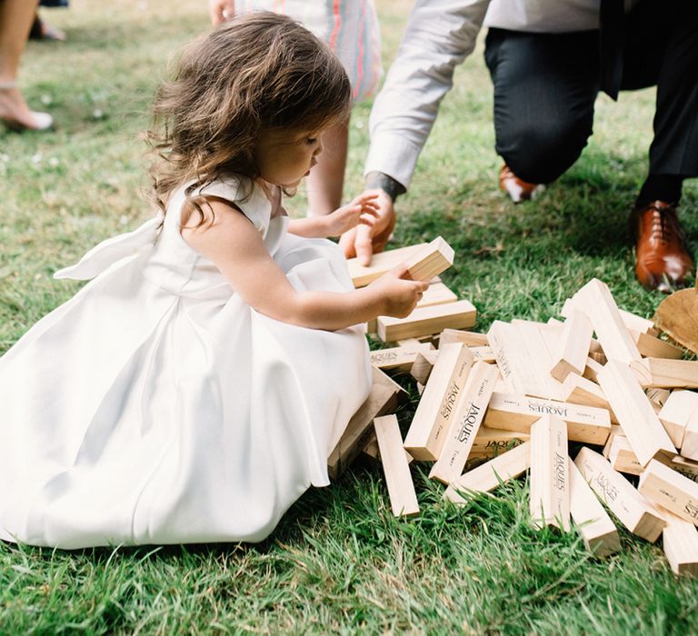 Flower Girl Playing Giant Jenga