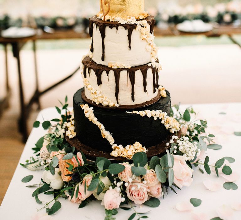 Homemade Four Tier Round Wedding Cake with Chocolate and Gold Layers and Drip Icing