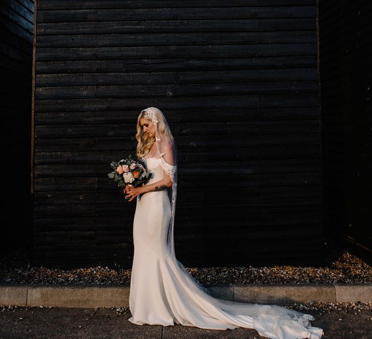 Glamorous Bride with Finger Waves Hair, Lace Edged Veil and Raciela  Pronovias Wedding Dress