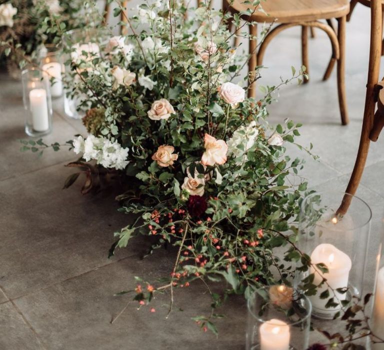 Aisle Wedding Flowers with Foliage and Peach Flowers