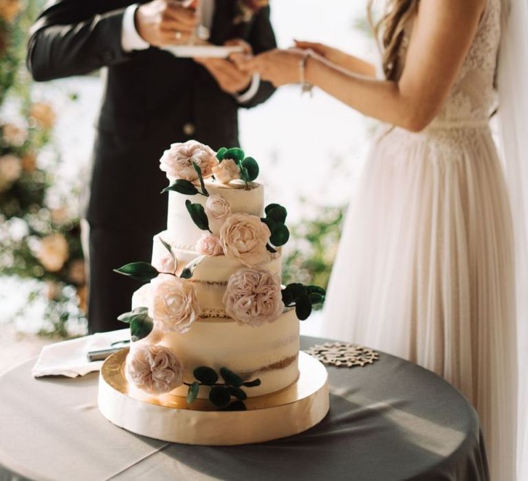 Semi Naked Wedding Cake Decorated with Fresh Flowers