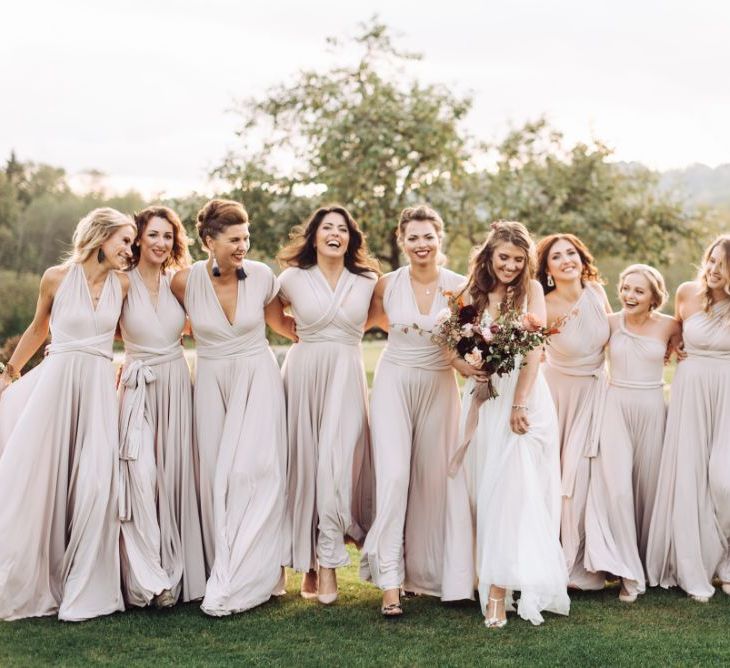 Bridal Party Portrait with Bridesmaids in Oyster Wrap Dresses and Bride in Fay Katya Katya Wedding Dress