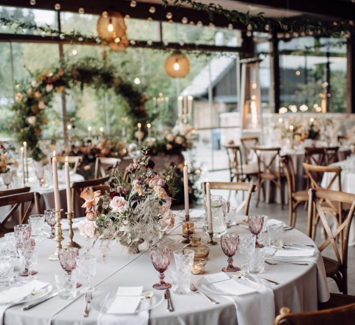 Blush Pink Table Decor with Taper Candles, Coloured Goblets and Flower Centrepieces