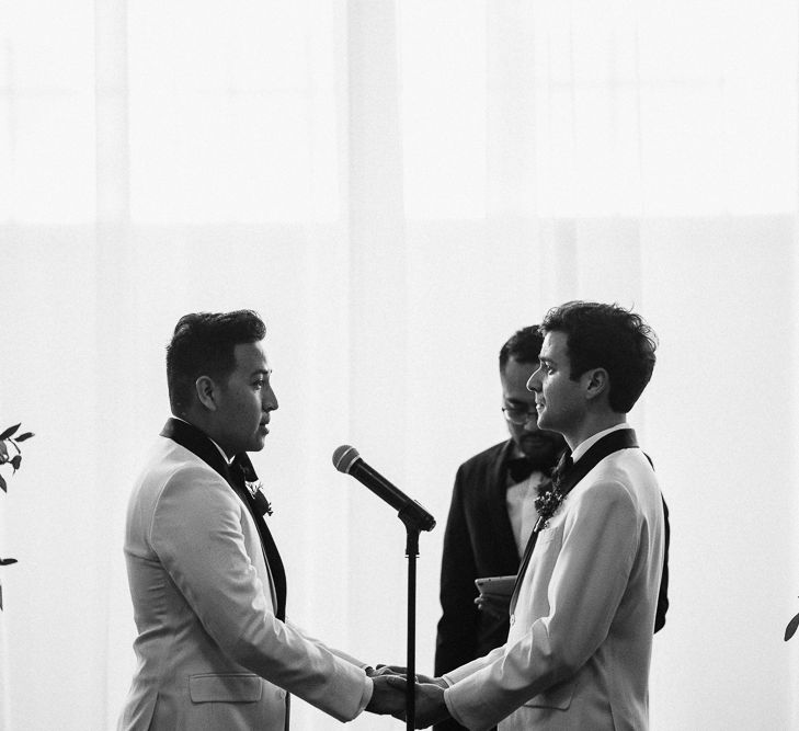 Same sex wedding ceremony in an airplane hangar in Seattle