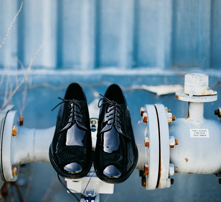 Shiny grooms wedding shoes