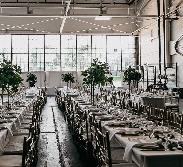 Industrial wedding reception at an airplane hangar in Seattle, USA