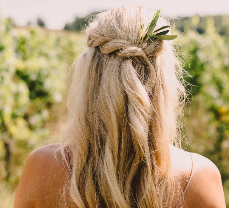 Twisted half up half down wedding hairstyle