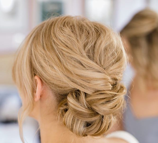 Woven and pinned wedding hairstyle