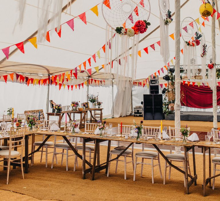 Hanging Wedding Hoops And Bright Bunting Image by Peppermint Love Photography