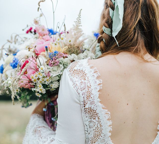 Lace back wedding dress and bell sleeves for boho bride -  wedding ideas for summer