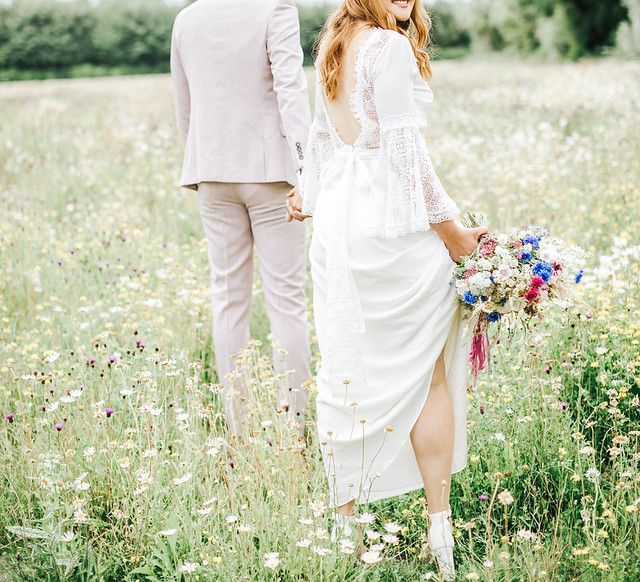 Boho bride with wavy hair and bridal braid