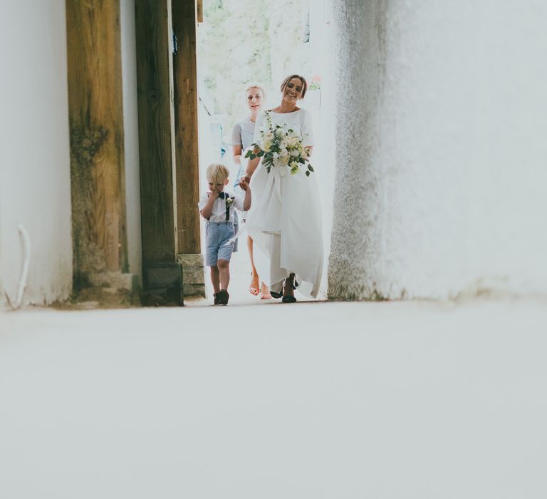 Bride With Pony Tail // Lusty Glaze Beach Wedding // Image By Ross Talling Photography