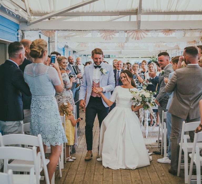 Bride With Pony Tail // Lusty Glaze Beach Wedding // Image By Ross Talling Photography