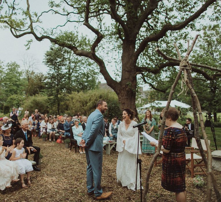 Outdoor Boho Wedding Ceremony with Naked Tipi Altar