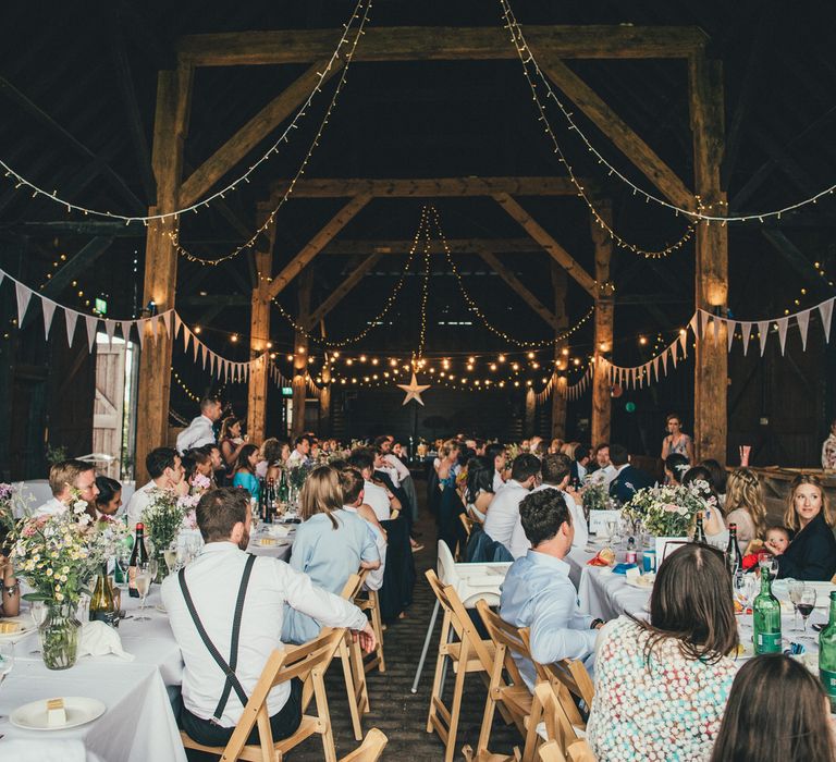 Exclusive Use Barn Wedding Venue with Bunting and Fairy Light Wedding Decor