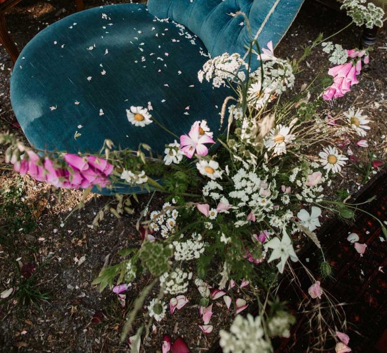 Velvet ceremony chair covered in confetti