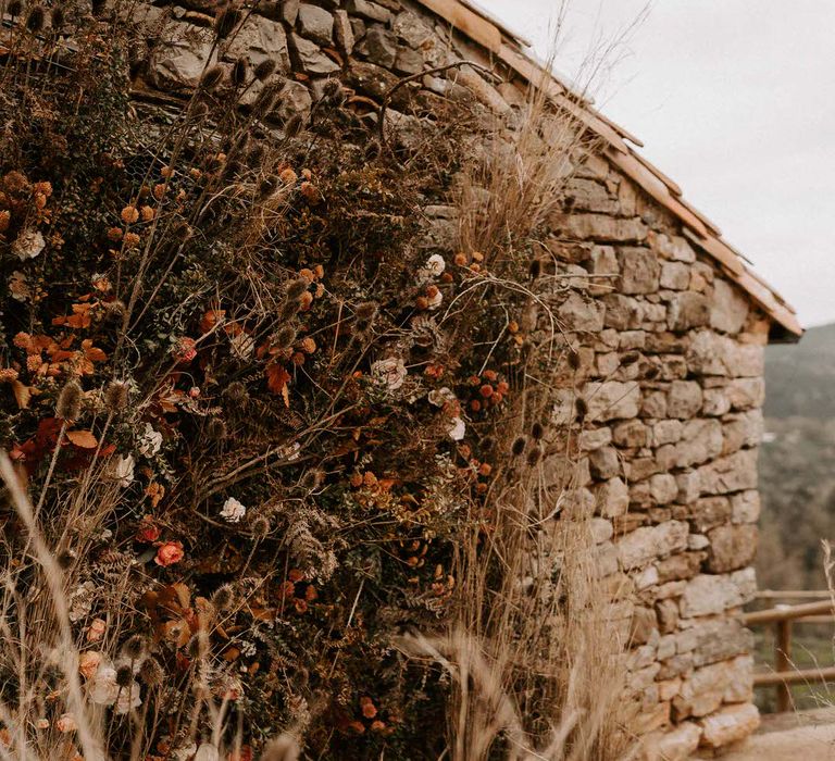 Rustic Brick Wall with Climbing Flowers