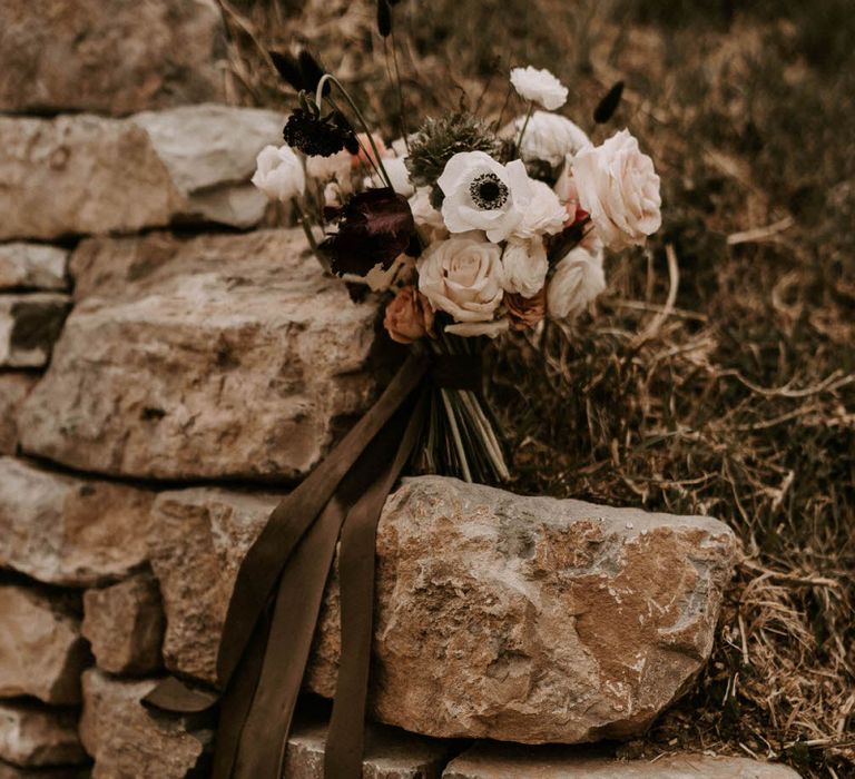 Wedding Bouquet on Rocks Tied with Ribbon