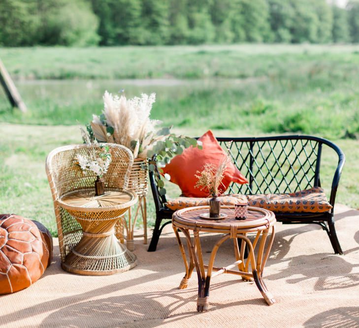 Peacock Chairs, Moroccan Poufs and Wicker Chair Seating Area