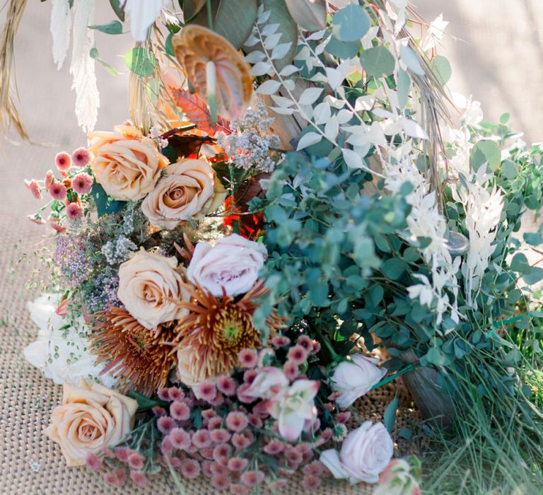 Foliage, Roses and Protea Wedding Flower Arrangement