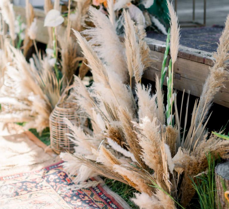 Dried Flower Stems and Grasses  in Wicker Baskets