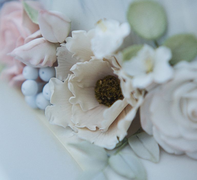 Icing Flowers For Wedding Cake // Winter Wedding Inspiration At Sennowe Park Norfolk With Cornflower Blue And Gold Details With Images From Salsabil Morrison Photography